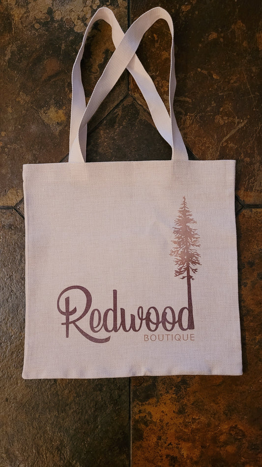 Canvas tote with our company logo displayed.